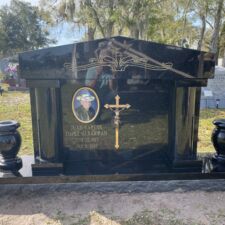 Pillar Monument Colum Bronze crucifix Lake Wiamauma Cemetery