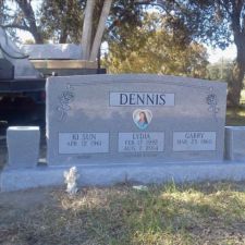 Upright monument for three
